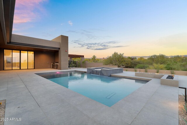 10354 E Celestial Dr, Scottsdale, AZ 85262 - view of pool featuring a patio area, an outdoor fire pit, and a pool with connected hot tub