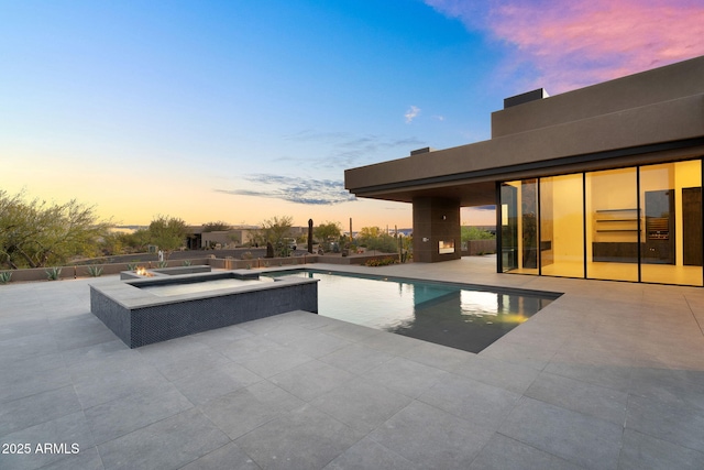 10354 E Celestial Dr, Scottsdale, AZ 85262 - view of swimming pool featuring a patio area, an outdoor fire pit, and a pool with connected hot tub