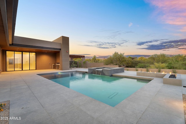 10354 E Celestial Dr, Scottsdale, AZ 85262 - view of swimming pool with a patio, an outdoor fire pit, a pool with connected hot tub, and a fenced backyard