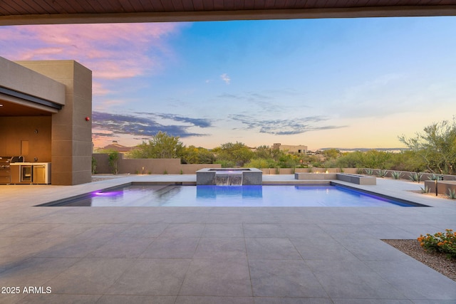 10354 E Celestial Dr, Scottsdale, AZ 85262 - view of swimming pool with a patio area, a pool with connected hot tub, a fenced backyard, and area for grilling