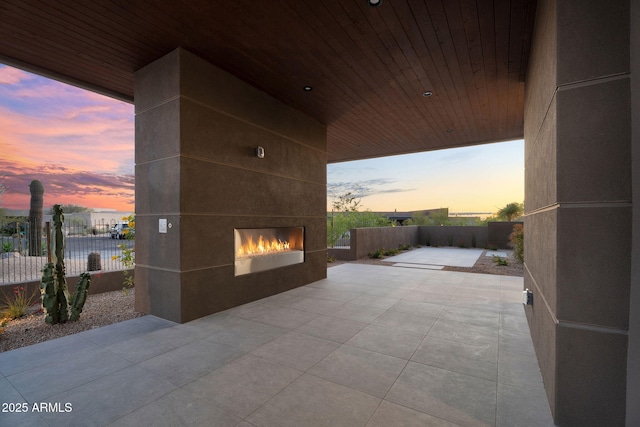10354 E Celestial Dr, Scottsdale, AZ 85262 - view of patio / terrace featuring a tile fireplace