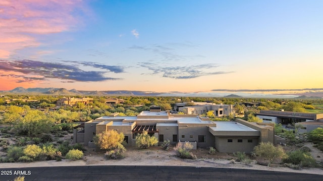 10354 E Celestial Dr, Scottsdale, AZ 85262 - view of front facade with a mountain view, stucco siding, and a garage