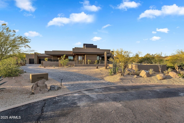 10354 E Celestial Dr, Scottsdale, AZ 85262 - view of front facade featuring a fenced front yard, stucco siding, and driveway