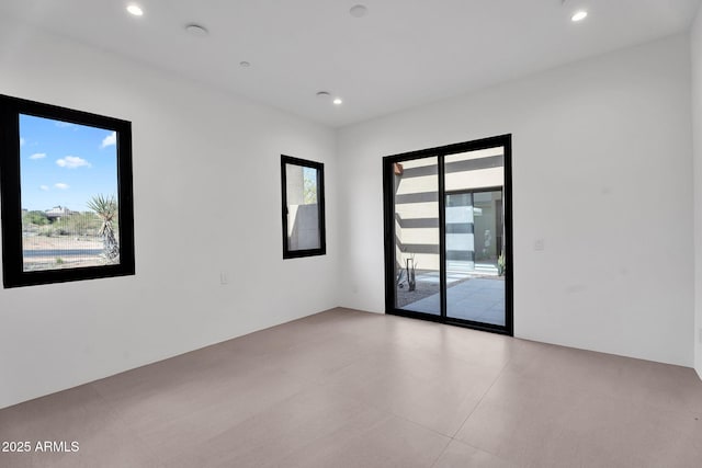 10354 E Celestial Dr, Scottsdale, AZ 85262 - spare room featuring recessed lighting and light tile patterned floors