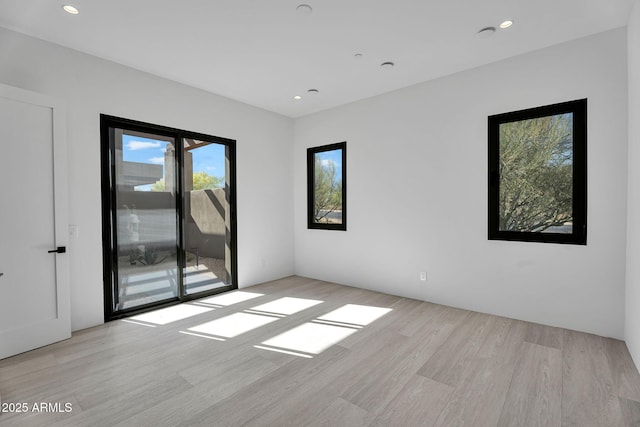 10354 E Celestial Dr, Scottsdale, AZ 85262 - unfurnished room with light wood-style floors and recessed lighting