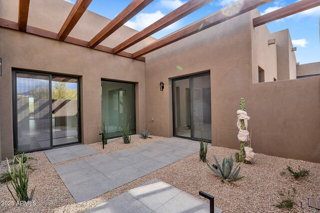 10354 E Celestial Dr, Scottsdale, AZ 85262 - rear view of property with stucco siding and a patio area
