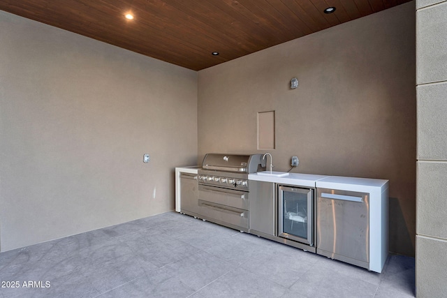 10354 E Celestial Dr, Scottsdale, AZ 85262 - view of patio with an outdoor kitchen and beverage cooler