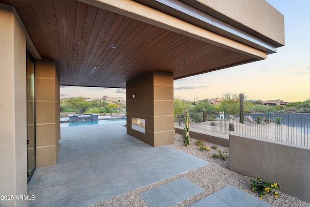 10354 E Celestial Dr, Scottsdale, AZ 85262 - view of patio / terrace featuring a pool with connected hot tub and fence