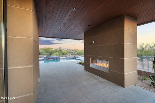 10354 E Celestial Dr, Scottsdale, AZ 85262 - view of side of home with a fireplace, a patio, and a pool with connected hot tub