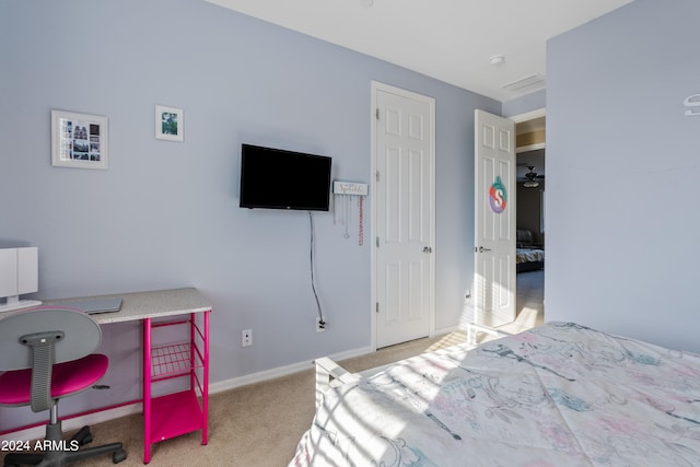 bedroom with light carpet