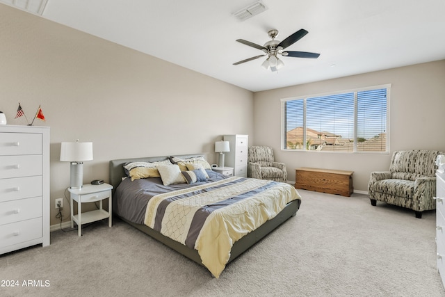 bedroom with ceiling fan and carpet