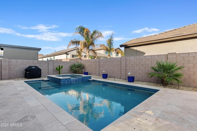 view of patio / terrace featuring an outdoor living space with a fire pit