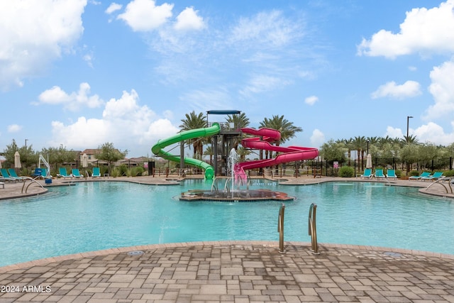 view of pool featuring a water slide