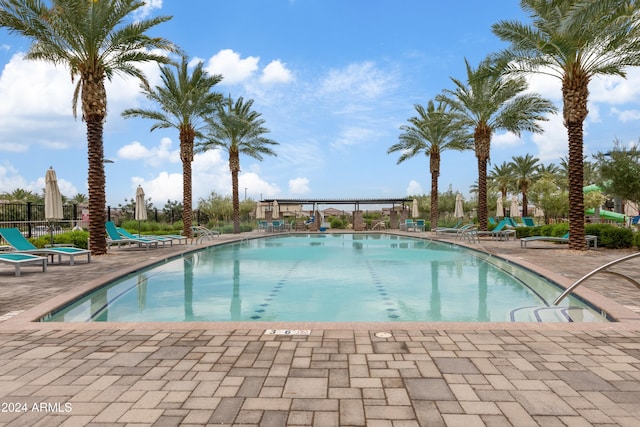 view of swimming pool with a patio