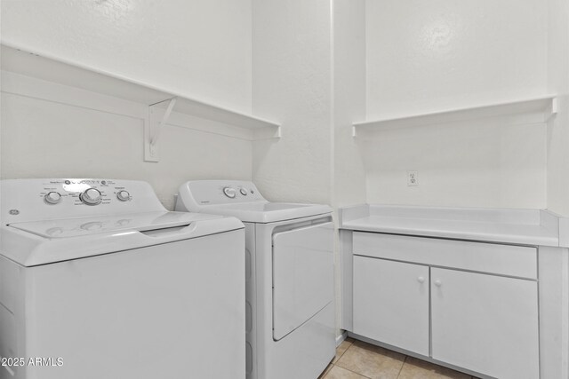 1225 N 36th St Unit 1015, Phoenix, AZ 85008 - laundry room with washer and clothes dryer and light tile patterned floors