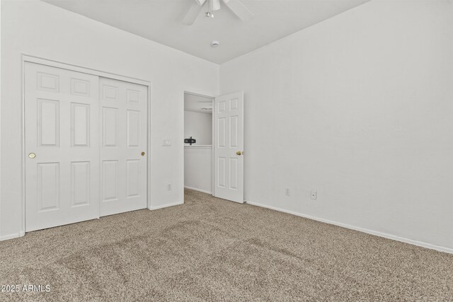 1225 N 36th St Unit 1015, Phoenix, AZ 85008 - unfurnished bedroom featuring carpet floors, baseboards, a closet, and a ceiling fan