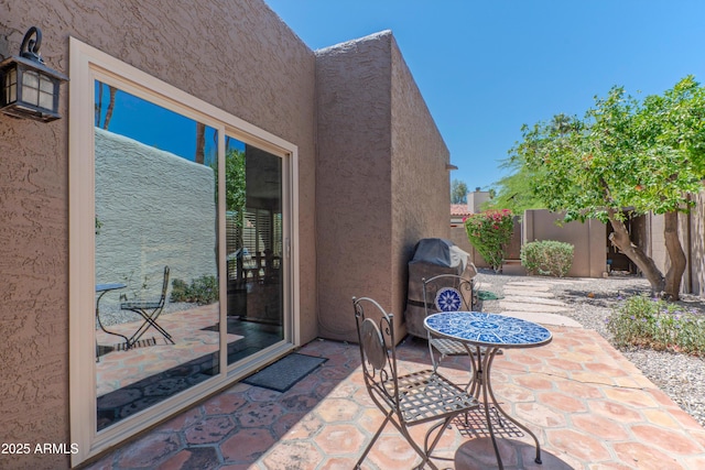 7302 E Rose Ln, Scottsdale, AZ 85250 - fenced backyard with a patio and a grill