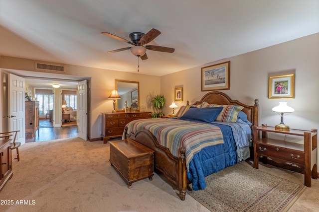 7302 E Rose Ln, Scottsdale, AZ 85250 - bedroom with carpet floors, baseboards, and a ceiling fan