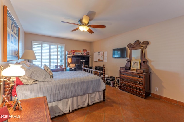 7302 E Rose Ln, Scottsdale, AZ 85250 - tiled bedroom with ceiling fan