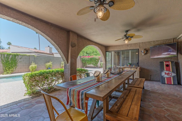 7302 E Rose Ln, Scottsdale, AZ 85250 - view of patio / terrace featuring a ceiling fan and outdoor dining space