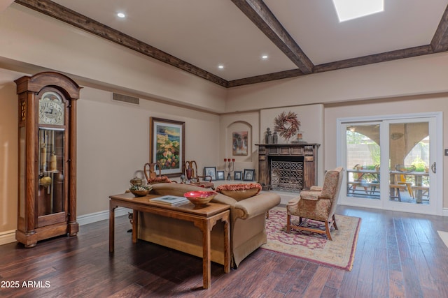 7302 E Rose Ln, Scottsdale, AZ 85250 - living room featuring a fireplace, dark wood finished floors, beamed ceiling, and baseboards