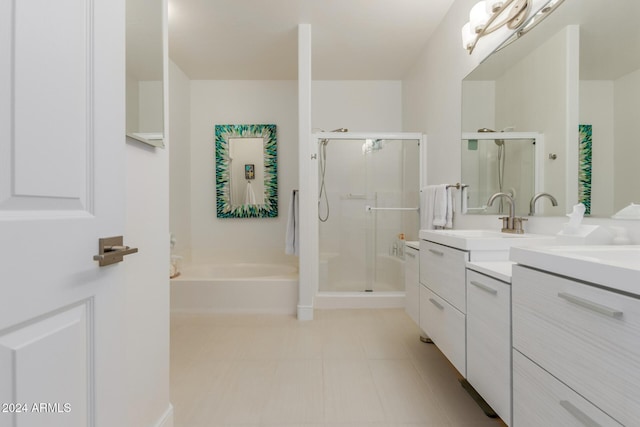 bathroom featuring vanity and a shower with door