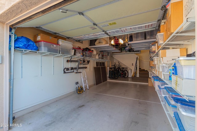 garage featuring a garage door opener