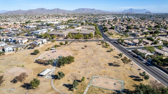 birds eye view of property featuring a mountain view