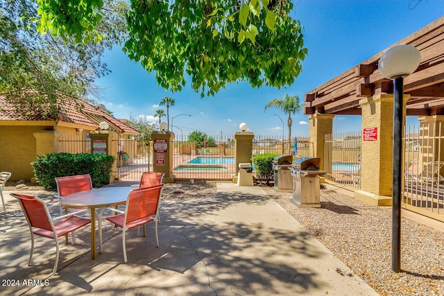 view of patio / terrace featuring a grill