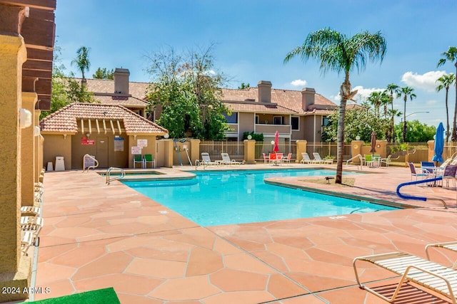 view of pool featuring a patio