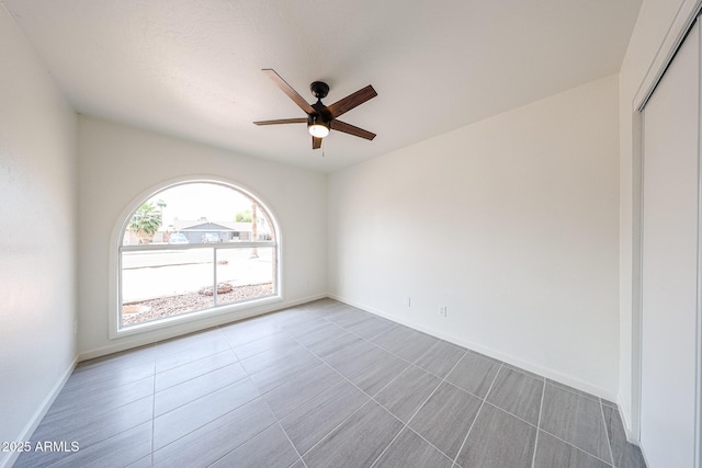 4528 W Butler Dr, Glendale, AZ 85302 - empty room featuring ceiling fan and baseboards
