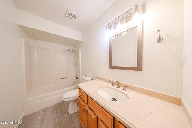 4528 W Butler Dr, Glendale, AZ 85302 - bathroom with toilet, vanity, and bathing tub / shower combination