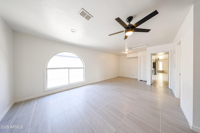 4528 W Butler Dr, Glendale, AZ 85302 - empty room with a ceiling fan and baseboards