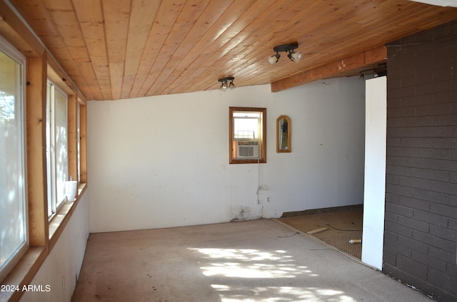 655 W Caroline St, Coolidge, AZ 85128 - spare room with vaulted ceiling, cooling unit, and wooden ceiling