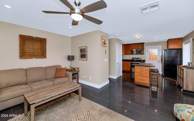 living room with ceiling fan