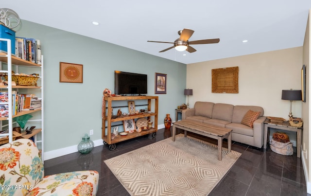 tiled living room featuring ceiling fan