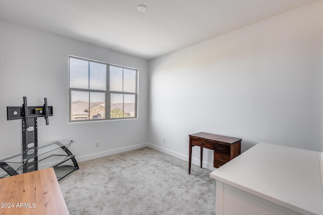 interior space featuring light colored carpet