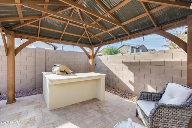 view of patio featuring a gazebo