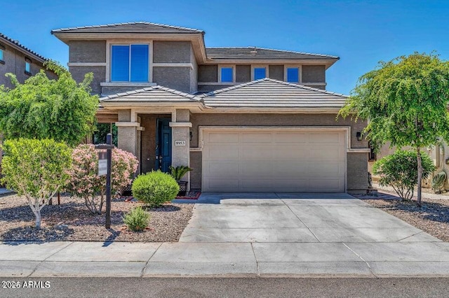 view of front of property with a garage