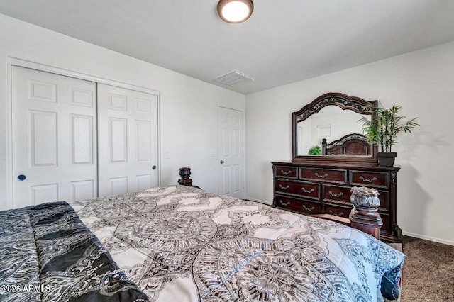 carpeted bedroom with a closet