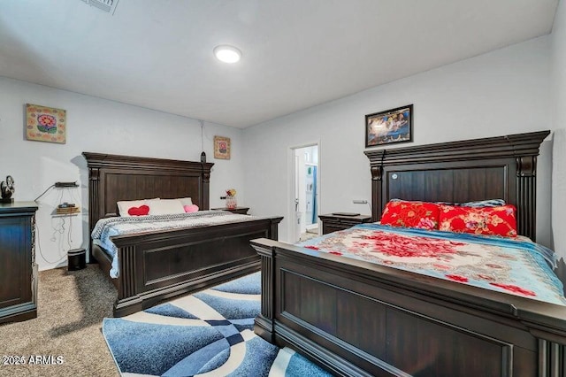 bedroom featuring dark colored carpet