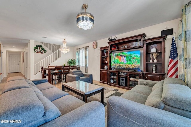 living room with a notable chandelier