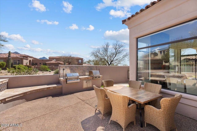 view of patio / terrace featuring grilling area and exterior kitchen