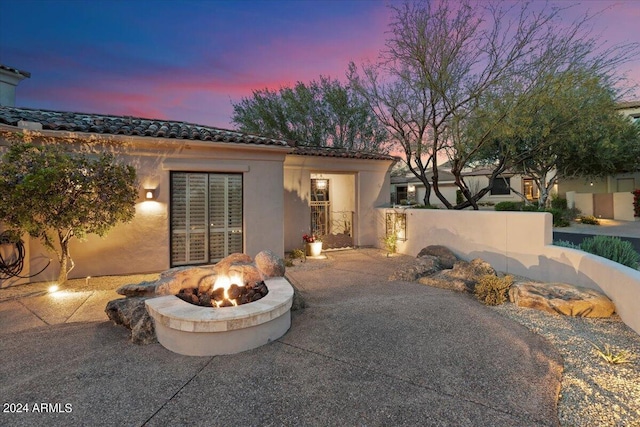 exterior space featuring a fire pit