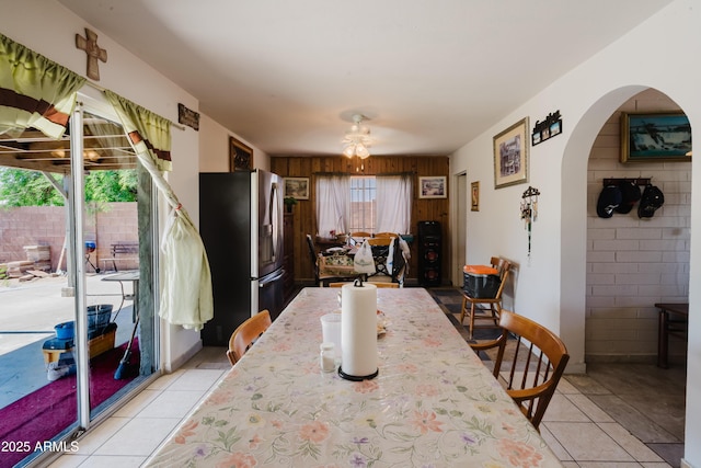5637 N 63rd Dr, Glendale, AZ 85301 - dining space featuring arched walkways, light tile patterned floors, and ceiling fan