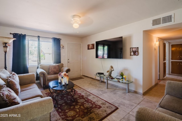 5637 N 63rd Dr, Glendale, AZ 85301 - living area featuring light tile patterned floors and a ceiling fan