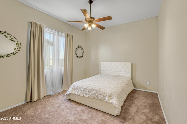 bedroom featuring a ceiling fan, carpet flooring, and baseboards