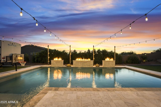 outdoor pool with a patio