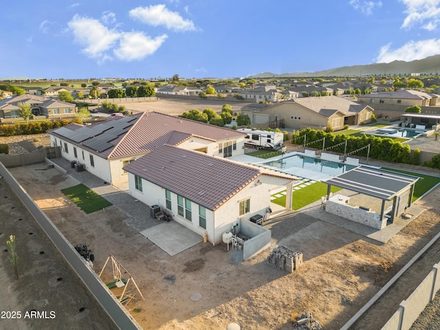 bird's eye view featuring a mountain view and a residential view