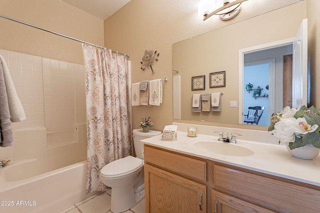 full bathroom featuring vanity, toilet, tile patterned flooring, and shower / bath combo